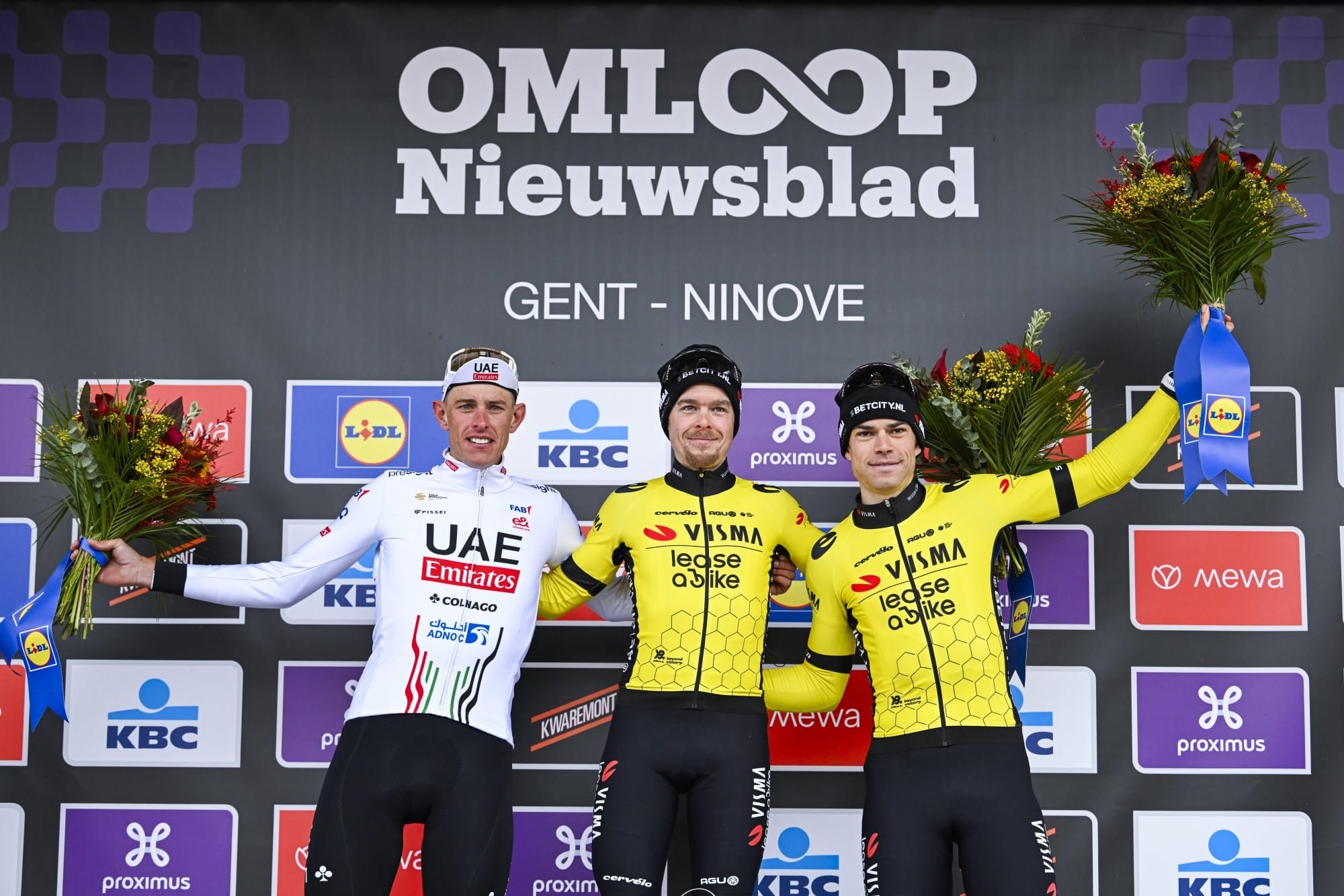 Team Visma | Lease a Bike riders celebrate having won the Spring Classic of Omloop het Nieuwsblad