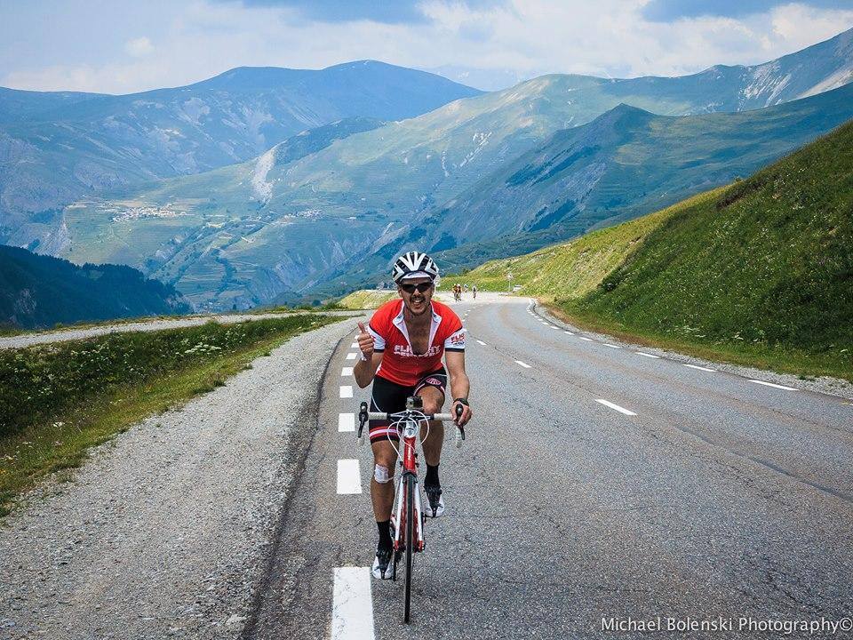 A rider celebrates having got to the end of the Vuelta Asturias trip